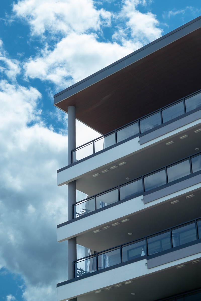 A tall building with balconies and balconies on it